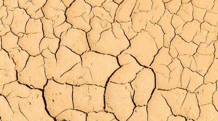 Abstract Pattern Line of Natural Cracked Ground in Countryside with Light Brown Soil Color Background Texture