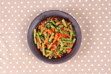 Spicy fried cowpea with minced pork call Pad Ped Tua.