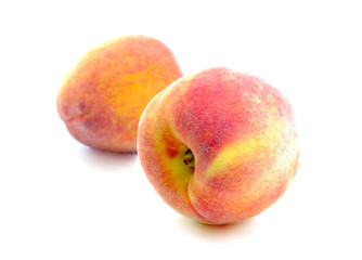 Peach on white background.