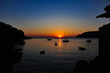 Boats in the sunset at Limeni in Peloponese