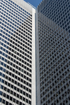 Close up of reflective glass surface of financial building