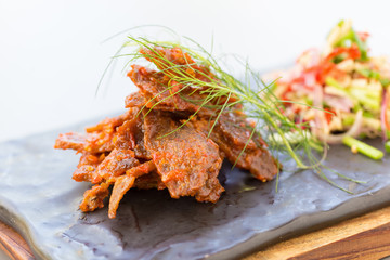 Crispy fried slice beef with crushed red big chilli.