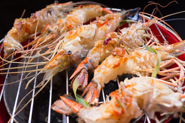 Shrimp on the grill and sauce.