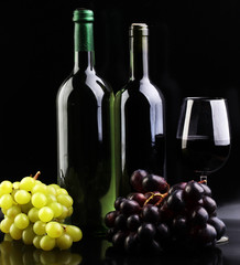 Wine glass and Bottle on black background. Red and white wine