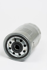 Metal car fuel filter isolated over white background
