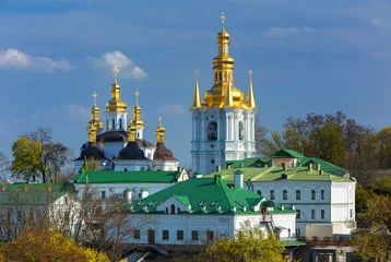 Foto op Aluminium Orthodox Christelijk klooster, Pechersk Lavra in Kiev op groene heuvels van Pechersk. Kiev klooster van de grotten in de hoofdstad van Oekraïne, Kiev. © Rastislav Sedlak SK