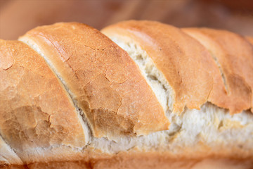 Fresh baked white bread crust close up