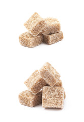 Pile of brown sugar cubes isolated