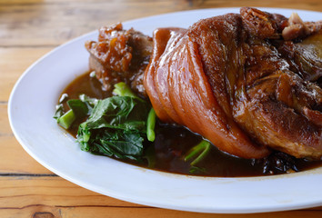 Young Hipster Asian Woman are Enjoy Eating Yunnan Stewed Pork