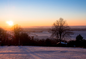 Sunset over the city of Olomouc, view from Svaty Kopecek (Holly Hill) in winter, Czech Republic.
