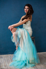 Fashion photo of beautiful lady wearing sparkling evening dress