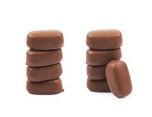 Chocolate coated toffee candy isolated