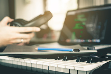 Musician prepare to writing his new song in studio