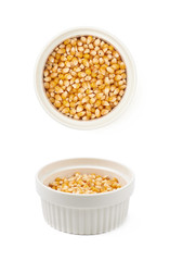 White ramekin filled with corn kernels