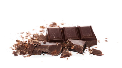 chocolate bars and chopped isolated on white