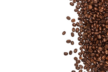 Coffee beans background, roasted coffee beans on a white background, top view, a flat pattern, space for text.