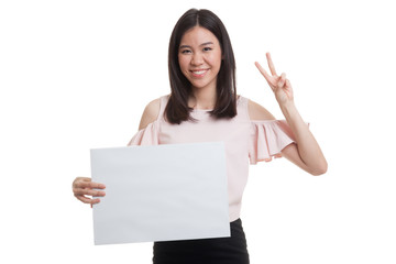 Young Asian business woman show victory sign with blank sign.