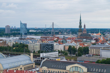 Obraz premium Rooftops and towers of the Riga skyline
