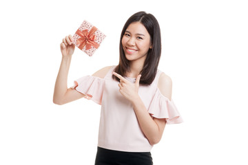 Young Asian business woman with a gift box.