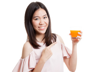 Young Asian woman point to orange juice.