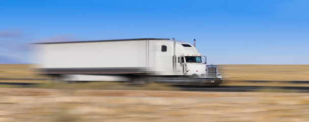 white truck on the move