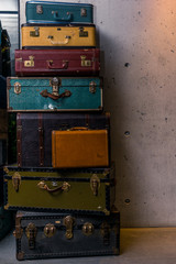 Stack of colorful vintage suitcases - 1