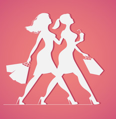 Silhouette of women with shopping bags