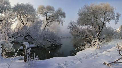 Winter river, foggy and frosty morning.