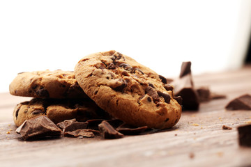 Chocolate cookies on wooden table. Chocolate chip cookies shot