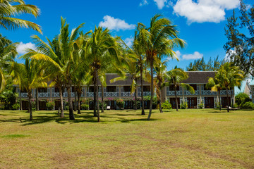 Beach bungalows in tropical garden on southern coast of Mauritiu