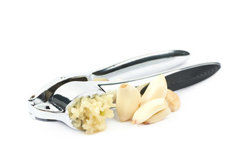Metal garlic press utensil isolated