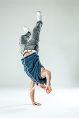 Man break dancer on white studio background