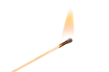 Burning safety-match with red, orange, yellow fire. Isolated on white background. Burning match in...