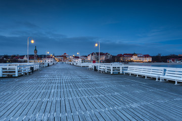 Cold winter morning, Pier in Sopot at sunrise time with amazing colorful sky. Poland.
