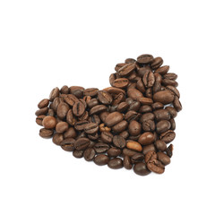 Heart shaped pile of coffee beans isolated