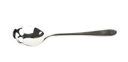 Skull shaped teaspoon isolated