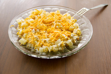 Festive salad with chicken breast, sweet corn, cheese and pineap