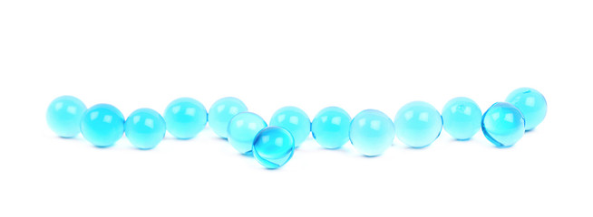 Line of blue soil water beads isolated