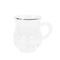 Cow's udder shaped glass cup isolated