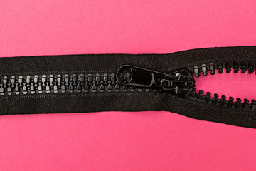 Zipper on a pink background