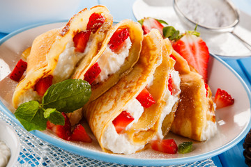 Crepes with strawberries and cream 
