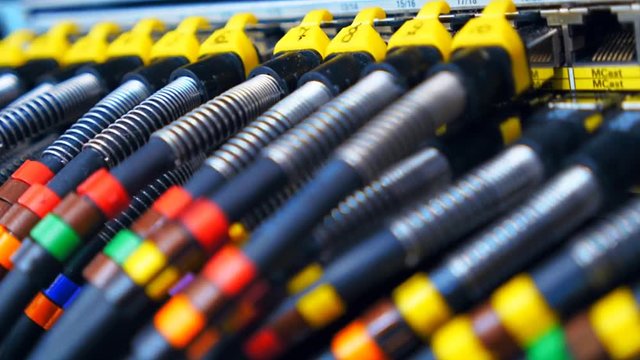 Great amount wires with colored markers are included in the electronic equipment. Shot in motion