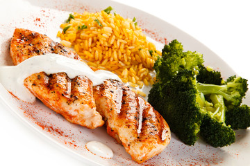 Grilled chicken fillets, rice and vegetables 