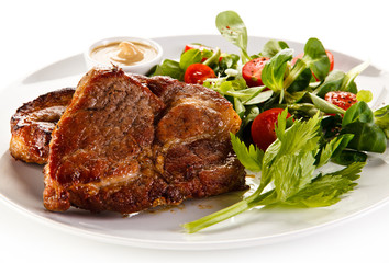 Grilled steaks and vegetables