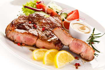 Grilled steaks and vegetables 