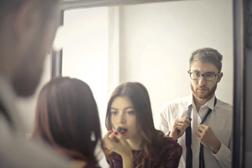 Couple getting ready to go out 