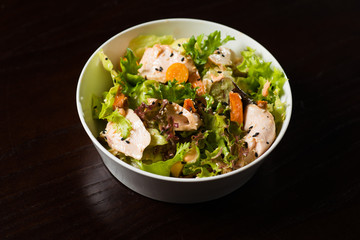 salad of chicken and vegetables with herbs