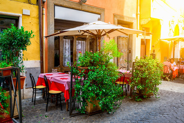 Plakat Cozy old street in Trastevere in Rome, Italy