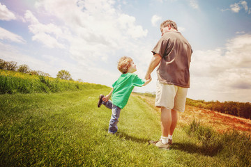 Fototapeta premium Father and son taking a walk outside, Instagram