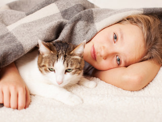 Unhealthy child lying in bed